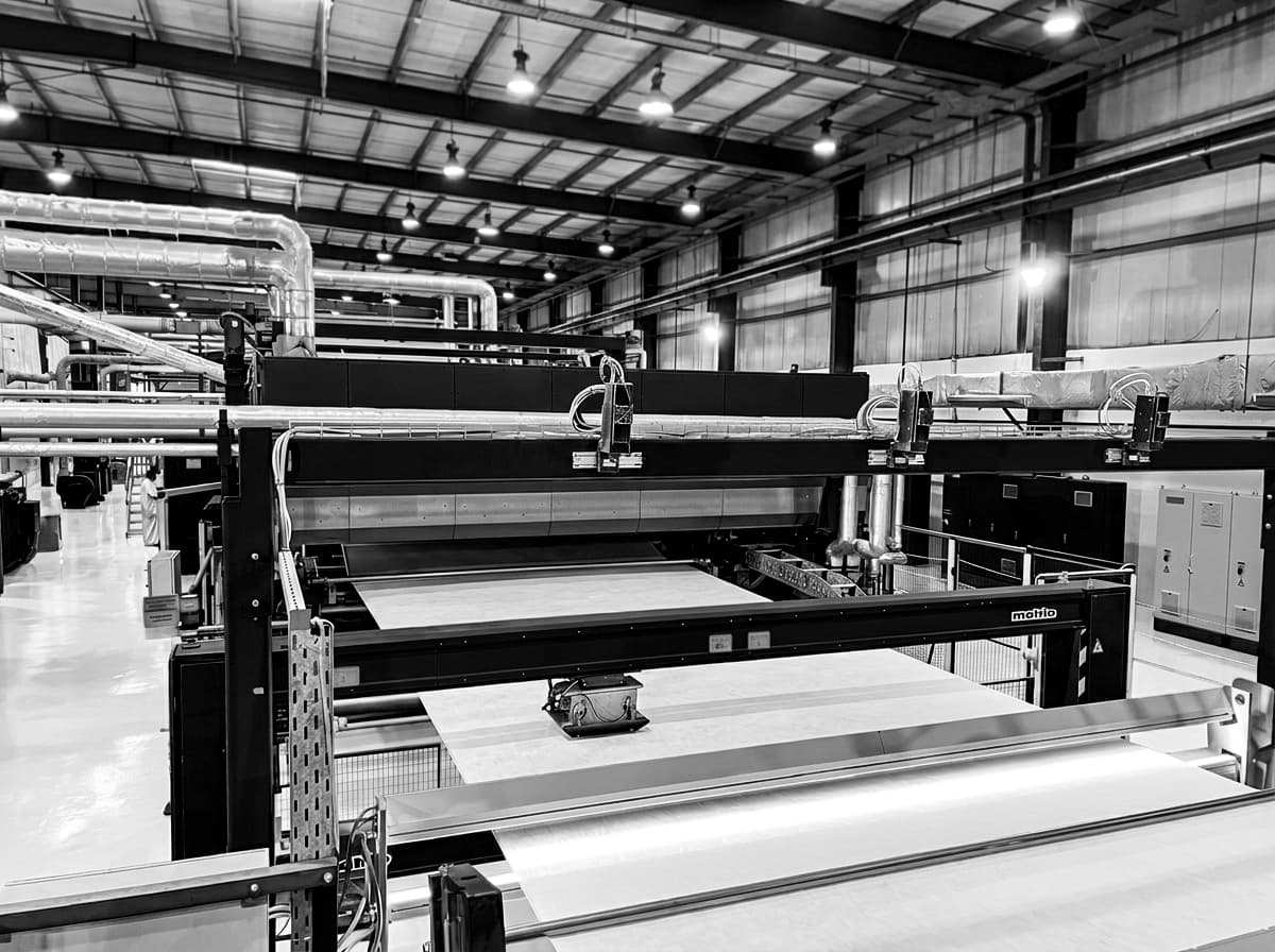 Industrial manufacturing facility with nonwoven production lines